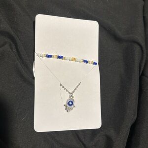 Silver Hamsa Hand Necklace with Blue Evil Eye